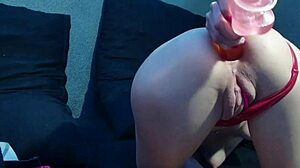 latex-clad amateur fingers her big ass with dildo and monster cock in homemade close-up