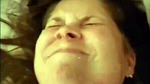 busty milf brunette sucking bbc dildos while masturbating