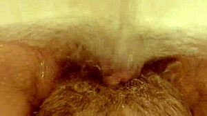 Watch her explode in a water orgasm! Feel the intense rush as she climaxes wildly under the spray.