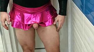 Tranny in Tight Leotard and Glossy Skirt Stuns