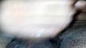 The WOMAN MASTURBATES while being WATCHED by the VOYEUR.