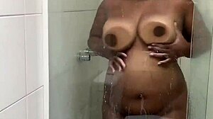 Ebony anime babe teases big tits and monster cock in steamy shower