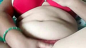 in this story, pornstar poosoo is massaging her big boobs in a sensual scene