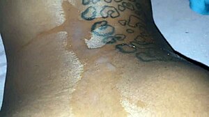 Big black cock fucks pussy in quickie. Squirts nut on her tattoos.