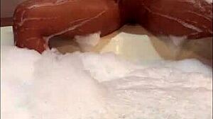 watch this ebony babe masturbate her big ass in the bathtub?