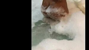 watch this ebony babe masturbate her big ass in the bathtub?