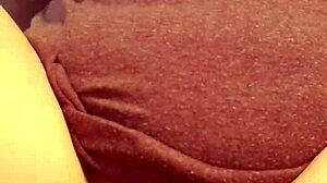 Redhead squirting her pussy in masturbation.