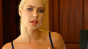 Beautiful woman enjoys creamy facial treatment.