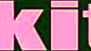 Tattooed girl with piercings and glasses uses screwdriver toy