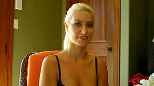 Beautiful woman enjoys creamy facial treatment.