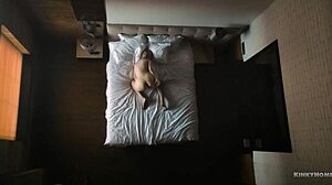 she's masturbating in bed, loving the orgasm