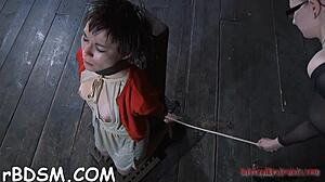 Ambitious brunette beauty enjoys self-teasing in bdsm