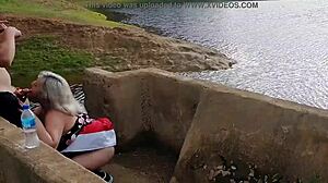 blonde slut with big ass gives blowjob in public lagoon, ends with creampie