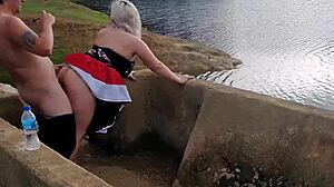 blonde slut with big ass gives blowjob in public lagoon, ends with creampie