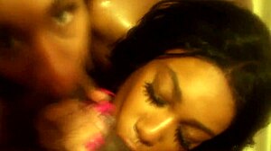 Ebony group performs double blowjob in public restroom as people knock on the door.