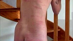 In the trailer, she dominates and whips me until I squirt and cum