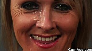 Naughty hottie receives bukkake cumshot on face while sucking