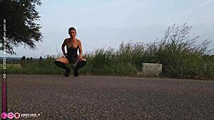 Outdoor porn shoot features small tits and shaved pussy by the roadside!