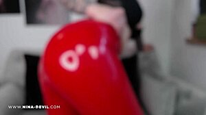 Red latex leggings worn