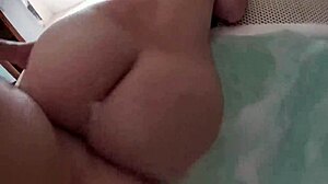 In the jacuzzi, a girl with big round ass rides my cock passionately