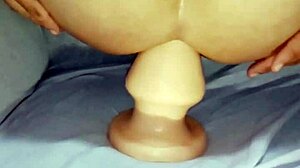 chubby shemale takes anal dildo in open ass