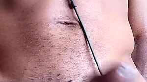 Stroking big black cock intensely until cum shoots onto the floor