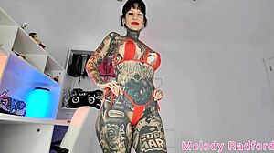 Tattooed Babe Tries On Micro Bikini