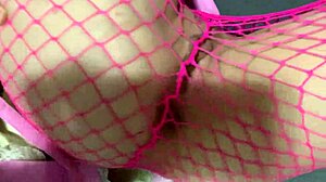 Beautiful Young Girl Performs Striptease in Pink Outfit