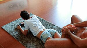 Gamer Girl's Passionate Footjob During Game