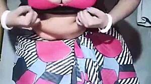 Look at this juicy bhabhi ripping clothes to show her boobs!