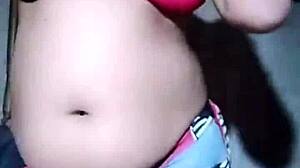 Look at this juicy bhabhi ripping clothes to show her boobs!