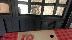 Latina woman interacts with delivery guy