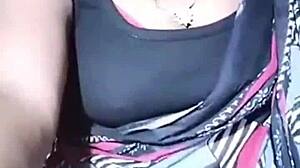 Look at this juicy bhabhi ripping clothes to show her boobs!