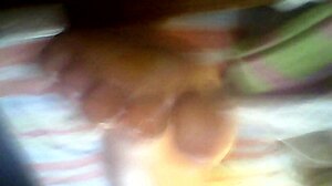 my wife gives me a footjob with leche on her feet