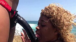 porsha carrera pounds nina rivera's pussy with strapon on beach