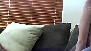 Liz flaunting big boobs in naked couch photoshoot