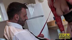 Look at this busty blonde submissive in stockings getting a handjob!