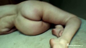 Alice showcases her back and butt in a glamorous nude photoshoot