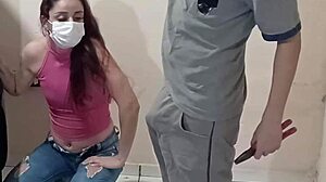 Employee Fixes Car in Workshop