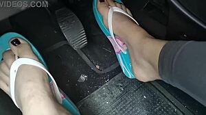 Sweaty Feet in Tasty Flip Flops Pedal Pumping. Her Curvy Soles Work the Car Pedals Hard.
