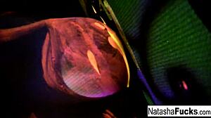 Busty natasha nice creates a fun and sexy black light video shoot