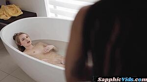 I watch these bathing lesbians scissor after licking each other