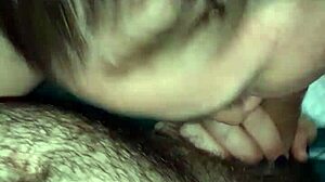 my girlfriend loves sucking my friend's cock, showing off her tits in this blowjob scene.