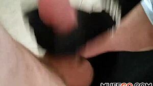 busty milf gives handjob