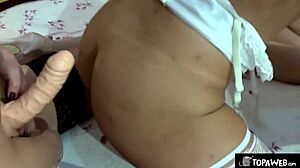 Hey, check this hot homemade strapon trio with a mature redhead and brunette!