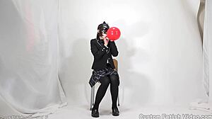 Girl playing with colorful balloons in fun ways. 😊