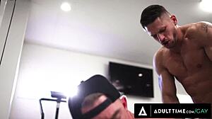 Muscular trainer buttfucks ripped client bareback in gym