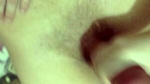 I gently tease my holes while licking his hard cock for pleasure.