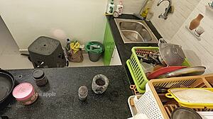 My girlfriend massaging her boobs with oil in the kitchen