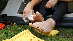 Wiping my dirty feet with a napkin during camping for minutes